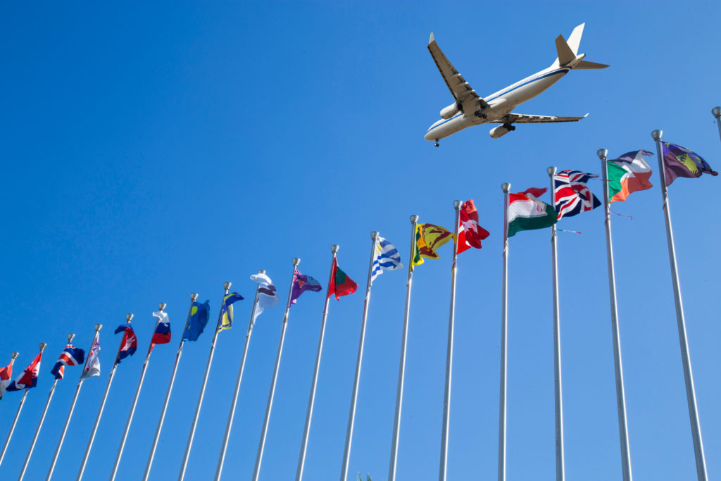 Airplane flyover the National flags